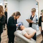 A three-panel photo narrative showing a woman training in a beauty school, performing a practical exam with an instructor, and proudly holding her framed cosmetology license in a salon.